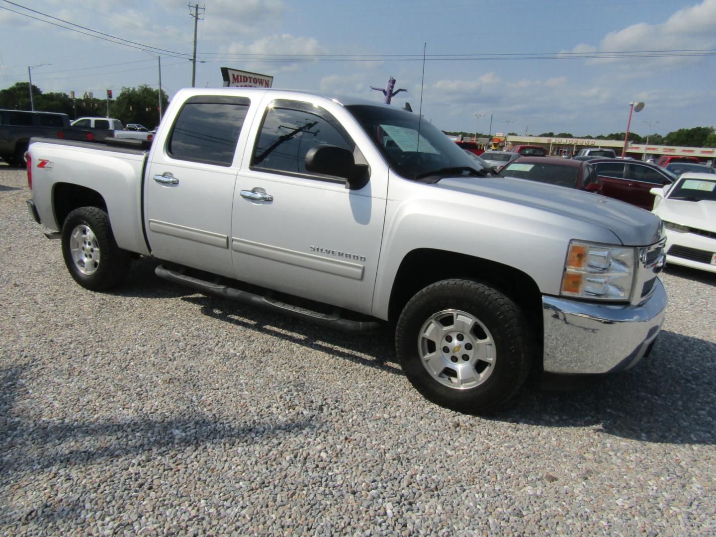 2013 Silver /Gray Chevrolet Silverado 1500 (3GCPKSE72DG) , Automatic transmission, located at 15016 S Hwy 231, Midland City, AL, 36350, (334) 983-3001, 31.306210, -85.495277 - Photo#0